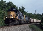 CSX 8524 leads a grain train eastbound.  Nice V sign from conductor.